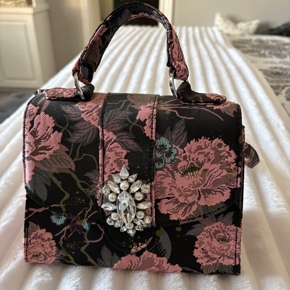 Small purse with jewel decoration